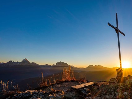 Rauher Kopf summit cross at sunset