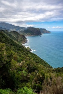 View of steep rocky coast and sea