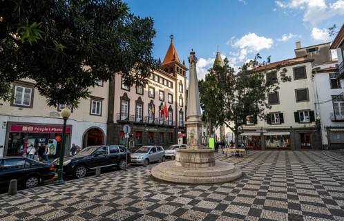 Square with mosaic floor and fountain in the old town