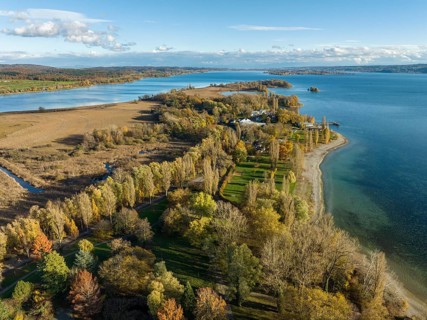 View over the autumnal Mettnau Park with the lido on the Mettnau peninsula in western Lake Constance