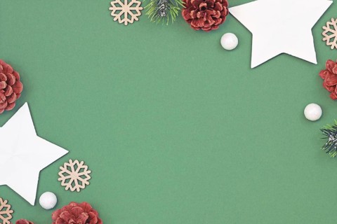 Christmas flat lay background with seasonal white paper stars