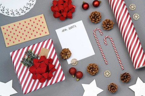 Seasonal Christmas holiday flat lay with concept for children letter to Santa Claus with white empty letter