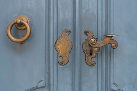Historic brass door lock and knocker