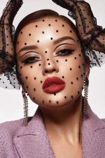 Portrait of a beautiful woman with creative makeup