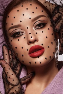 Portrait of a beautiful woman with creative makeup