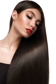 Beautiful brown-haired girl with a perfectly smooth hair