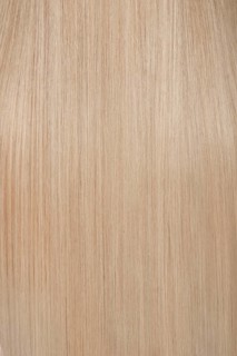 Close-up of shiny smooth blond hair