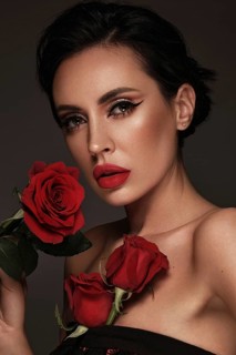 Beautiful brunette woman iwith a classic make-up