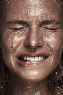 Portrait of a girl with emotion on her face. Photo taken in studio