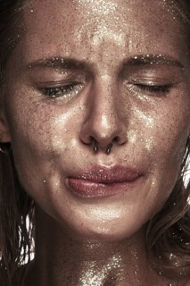 Portrait of a girl with emotion on her face. Photo taken in studio
