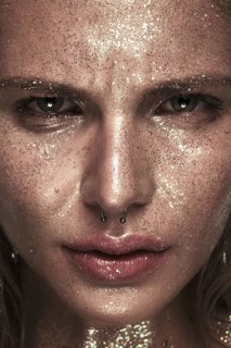 Portrait of a girl with emotion on her face. Photo taken in studio