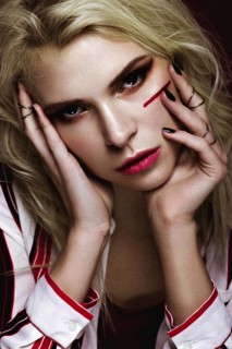Beautiful girl with art make up in white striped shirt. beauty face. Photos shot in studio