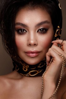 Beautiful Asian brunette model with volume curls