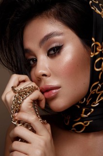 Beautiful Asian brunette model with volume curls