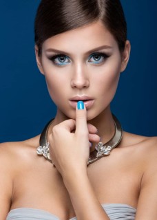 Beautiful woman with evening make-up and long straight hair