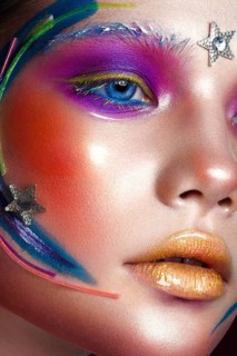 Beautiful girl with creative make-up in pop art style. Beauty face. Photo taken in studio