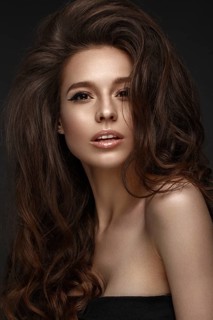 Beautiful brunette model with volume curls