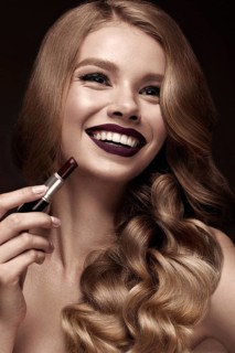 Beautiful blonde in a Hollywood manner with curls