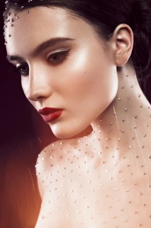 Portrait of a beautiful girl with a bright make-up