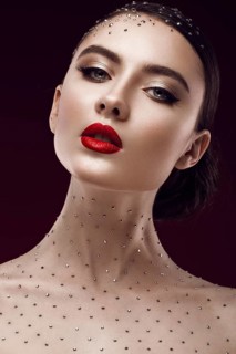 Portrait of a beautiful girl with a bright make-up