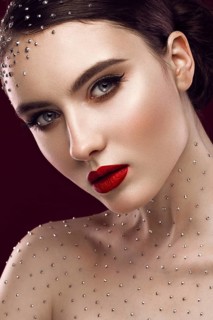 Portrait of a beautiful girl with a bright make-up