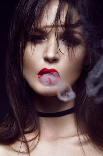 Beautiful sexy brunette girl with bright makeup