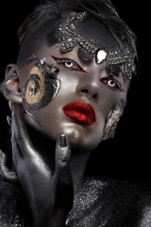 Portrait of a girl with creative art make-up. Unusual image. Photo taken in the studio