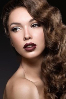 Beautiful woman with evening make-up and long hair