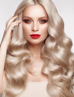 Beautiful blonde in a Hollywood manner with curls