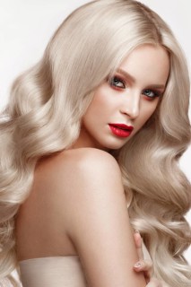 Beautiful blonde in a Hollywood manner with curls