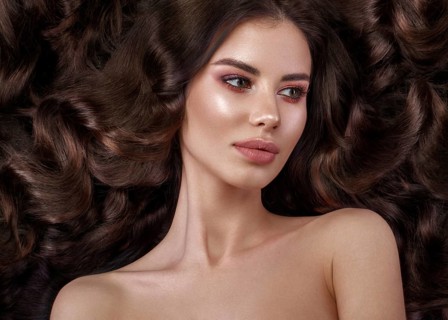 Beautiful brunette model with curls