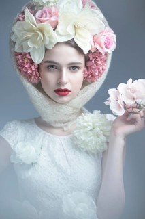 Beautiful girl in a headscarf in the Russian style