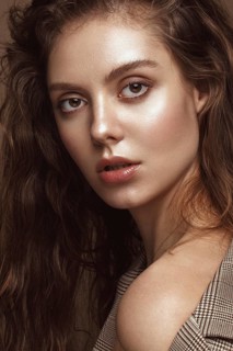 Beautiful brunette model with curls