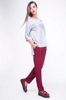 Pretty girl in fashionable stylish clothes