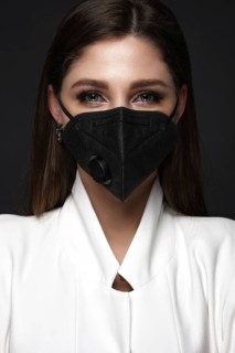 Manicurist in working form in black mask.. Nail photo content