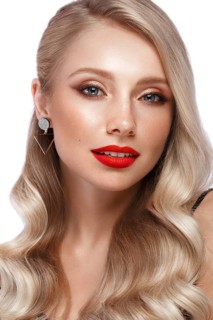 Beautiful blonde in a Hollywood manner with curls