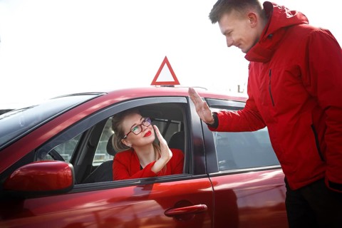 The driver is an auto school instructor and a female student on an examination car. Lesson at the circuit