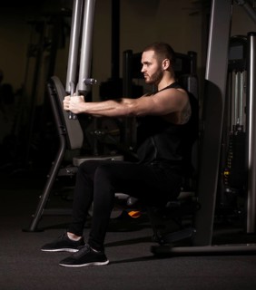 Sporty sexy men with great abdominal muscles in black sportswear