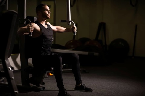 Sporty sexy men with great abdominal muscles in black sportswear