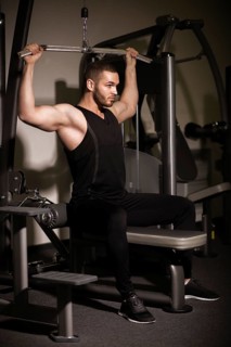 Sporty sexy men with great abdominal muscles in black sportswear