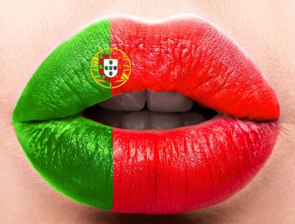 Female lips close up with a picture of the flag of Portugal. red