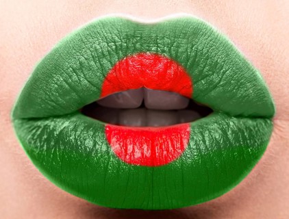Female lips close up with a picture of the flag of Bangladesh. red
