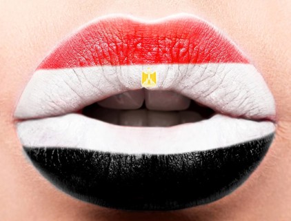 Female lips close up with a picture of the flag of Egypt. white