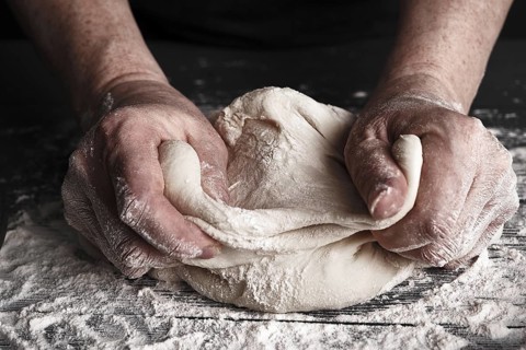 Cooking dough by elderly woman cook hands for homemade pastry bread