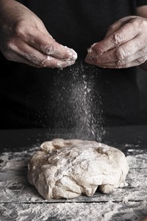 Cooking dough by elderly woman cook hands for homemade pastry bread