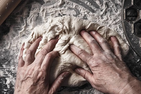 Cooking dough by elderly woman cook hands for homemade pastry bread