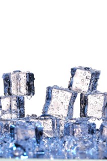 Transparent cold ice cubes on a white background