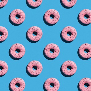 Sweet donuts pattern on a blue background