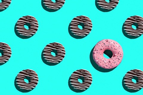 Sweet donuts pattern on a blue background