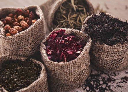 Collection of different varieties of tea in bags. White